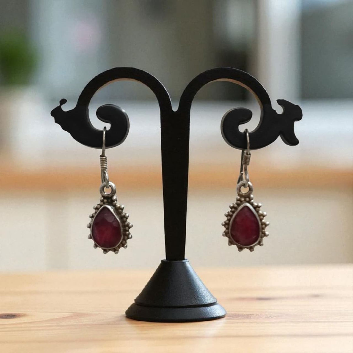 Red cut stone embedded  handcrafted 92.5 silver earrings with fish hook